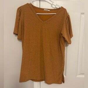 orange short sleeve top